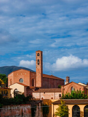 Lucca charming historical center. View of the city old skyline with medieval towers and St Francis gothic church