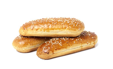 baked oblong sesame hot dog bun isolated on white background, stack