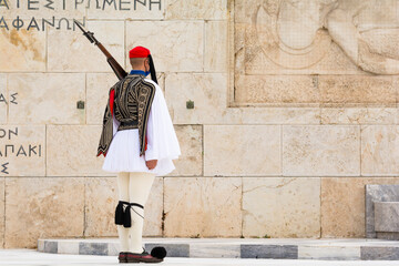 Soldier of the presidential guard standing in front of the monument of the Unknown Soldier in Athens, Greece.