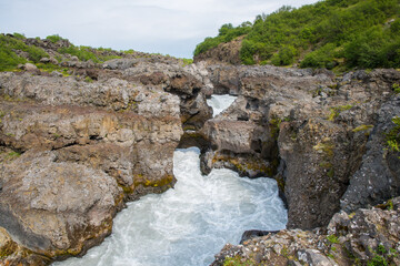 Waterfall Barnafossar in Hvita river in Borgarfjordur in the countryside of Iceland