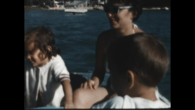 Mom Row Boat 1951 - Mom and the kids are enjoying the afternoon in the row boat  