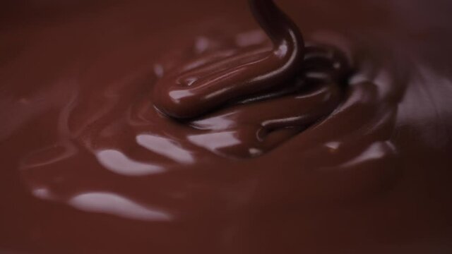 pouring melted chocolate slow motion
