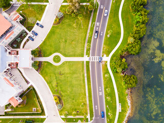 Hotel with a path to the ocean and a large lawn in front