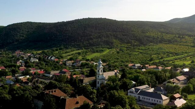 Rotating cinematic drone shot town near the Boldogkő Castle in Hungary