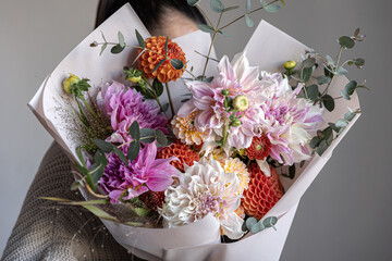 Close-up of a large festive bouquet with chrysanthemum flowers.