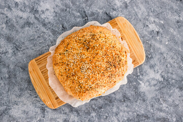 homemade bread with mixed seeds and herbs, simple ingredients concept