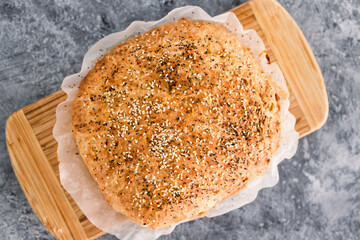 homemade bread with mixed seeds and herbs, simple ingredients concept