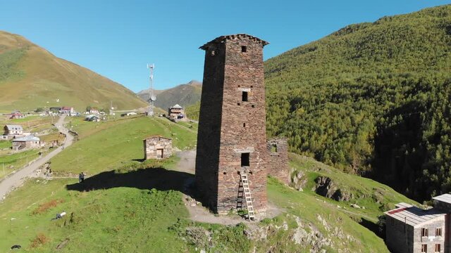 Flying around famous Svan tower in Ushguli village Svaneti region in Georgia