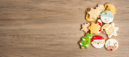 Merry Christmas with homemade cookies on wood table background. Xmas, party, holiday and happy New Year concept