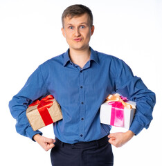 man with gifts. the guy is holding a lot of gifts. businessman congratulates on the holiday. isolated white background