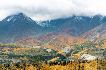 Stunning fall season, autumn in northern Canada during September on road trip vibes with snow...