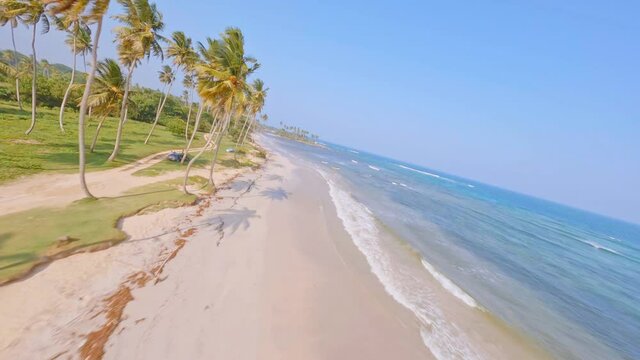 Aerial fpv racing drone over Los Coquitos beach, Dominican Republic