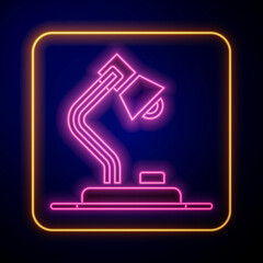Glowing neon Table lamp icon isolated on black background. Vector