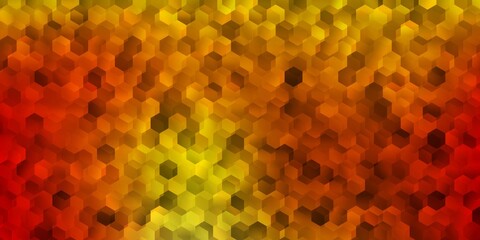 Light orange vector pattern with hexagons.
