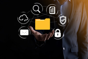 Document Management System DMS .Businessman hold folder and document icon.Software for archiving, searching and managing corporate files and information.Internet Technology Concept.Digital security