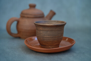 eramics, a ceramic product made with your own hands, made on a potter's wheel, a jug, a mug, clay.      