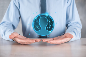 Businessman holding on hand icon of user man,woman low poly polygon style. Internet icons interface...