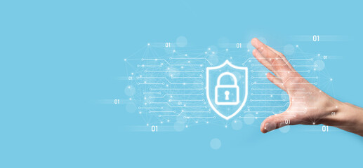 Protection network security computer and safe your data concept, Businessman holding shield protect icon. lock symbol, concept about security, cybersecurity and protection against dangers