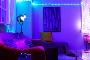 Interior of stylish room with neon lighting