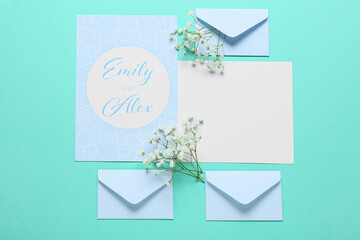 Cards with text EMILY & ALEX, envelopes and flowers on blue background