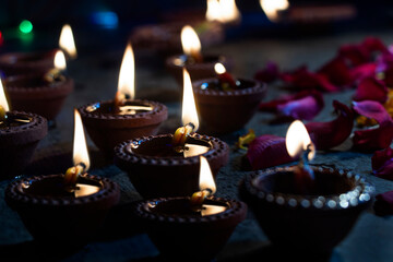 Fototapeta na wymiar Diwali lights with diyas oil lamps