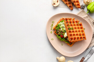 Plate with delicious Belgian waffles and vegetables on light background - obrazy, fototapety, plakaty