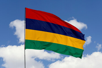 Mauritius flag isolated on the blue sky background. close up waving flag of Mauritius. flag symbols of Mauritius. Concept of Mauritius.