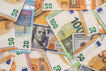 different euro and dollar banknotes, finance background