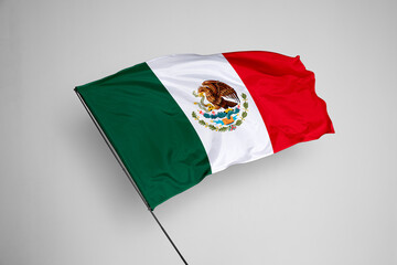 Mexico flag isolated on white background. close up waving flag of Mexico. flag symbols of Mexico. Concept of Mexico.