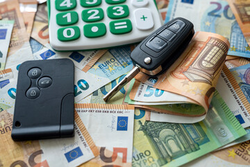 Car key with calculator on a european money