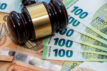 euro banknotes with judge hammer