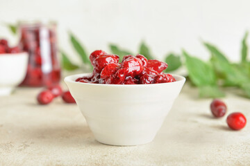 Bowl of sweet dogwood jam on table