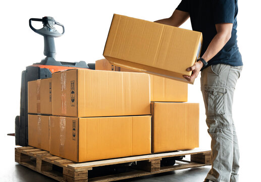 Worker Courier Lifting Packaking Boxes on Pallet. Delivery Customs Service. Shipping Supply Chain. Shipment Boxes. Cargo Warehouse Logistics.