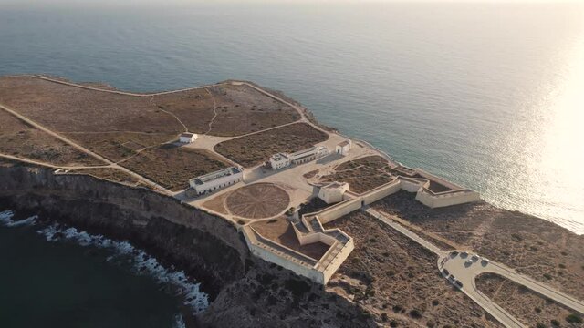 Orbital shot of Sagres fortress during sunrise, Portugal