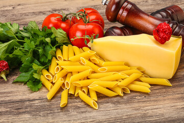 Raw penne rigate for cooking