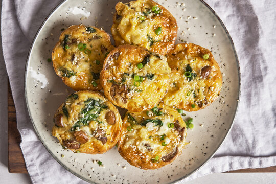 Vegetarian egg muffins with mushroom, spinach and cheese for Breakfast