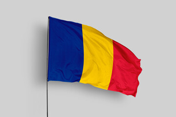 Romania flag isolated on the blue sky background. close up waving flag of Romania. flag symbols of Romania. Concept of Romania.