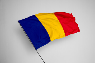 Romania flag isolated on white background. close up waving flag of Romania. flag symbols of Romania. Concept of Romania.
