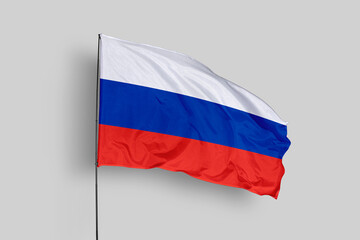 Russia flag isolated on the blue sky background. close up waving flag of Russia. flag symbols of Russia. Concept of Russia.