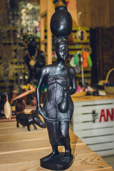 Fototapeta na wymiar African sculptures made of wood. African handicraft work 