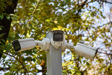 Security system of outdoor video surveillance, CCTV Security Camera on outdoors background