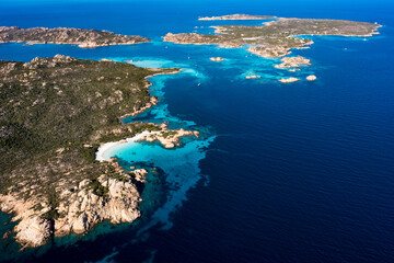 Fototapeta na wymiar View from above, stunning aerial view of La Maddalena archipelago with Budelli, Razzoli and Santa Maia islands bathed by a turquoise and clear waters. Sardinia, Italy.