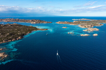 Fototapeta na wymiar View from above, stunning aerial view of La Maddalena archipelago with Budelli, Razzoli and Santa Maia islands bathed by a turquoise and clear waters. Sardinia, Italy.