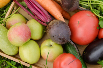 ripe fresh vegetables and fruits, beets, carrots, apples,  eggplant, tomato, pumpkin,