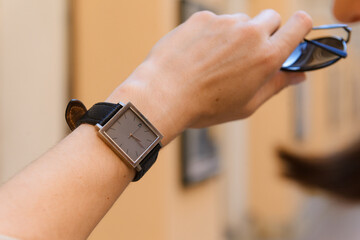 A hand with black watches