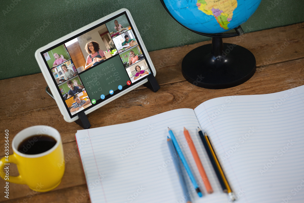 Poster smiling diverse elementary school pupils during class on tablet screen