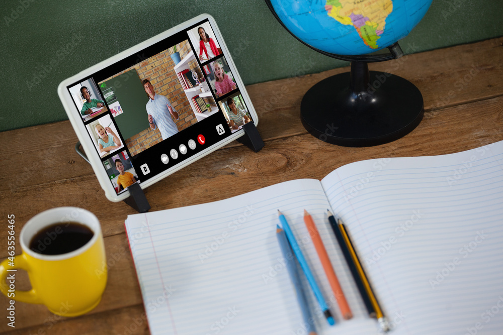 Poster smiling diverse elementary school pupils during class on tablet screen