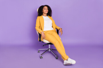 Photo of sweet tired lady wear yellow suit glasses smiling sitting office chair sleeping isolated...