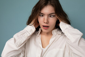 Attractive funny amusing joyful cute nice adorable tender young curly brunette woman wearing white...