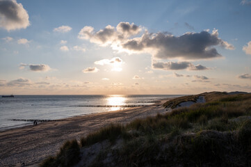 View on white sandy  beach, dunes and water of North sea between Vlissingen en Domburg, Zeeland, Netherlands